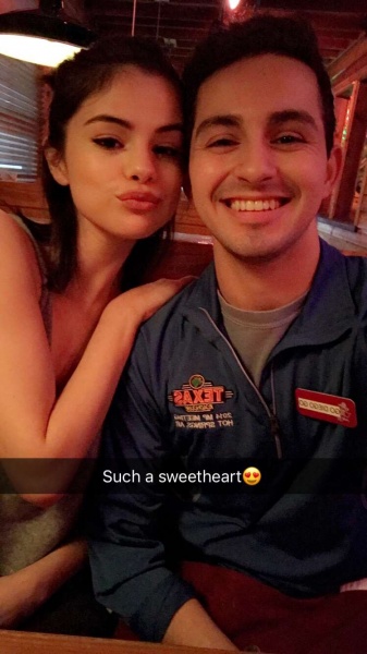 December 27: Selena with a fan at Texas Roadhouse in Lakeland Heights, TX (dieggooo on Twitter via Snapchat)
