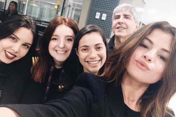 March 25: Selena with fans at the airport in São Paulo, Brazil.
