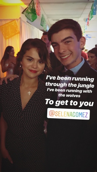 June 23: Selena Gomez with a fan at CHOC Children’s Hospital prom in Orange County, CA. (credit:nathanseidman)
