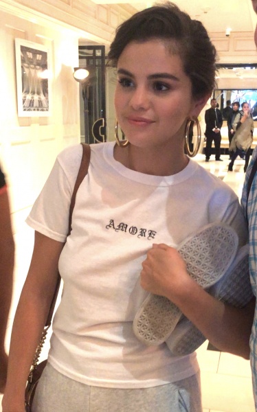 June 28: Fan taken photo of Selena leaving The London West Hollywood Hotel in West Hollywood, CA.
