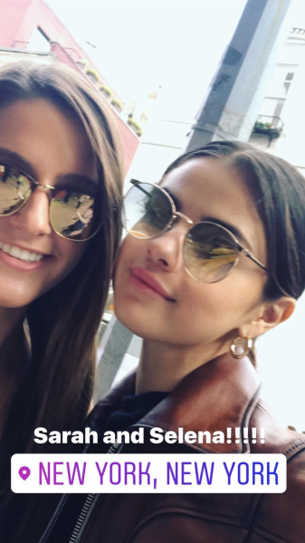 September 30: Selena with a fan in New York, NY. (credit: selenagomezbiggestmomfan)
