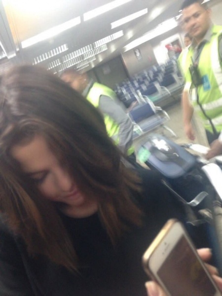 March 25: Selena at the airport in São Paulo, Brazil.
