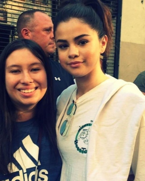September 4: Selena with a fan in New York. (credit: g.sofi)
