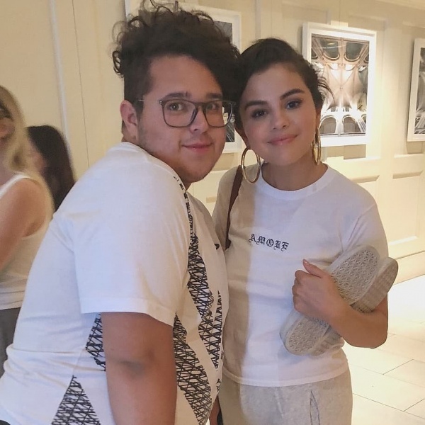 June 28: Selena with a fan at The London West Hollywood Hotel in West Hollywood, CA.
